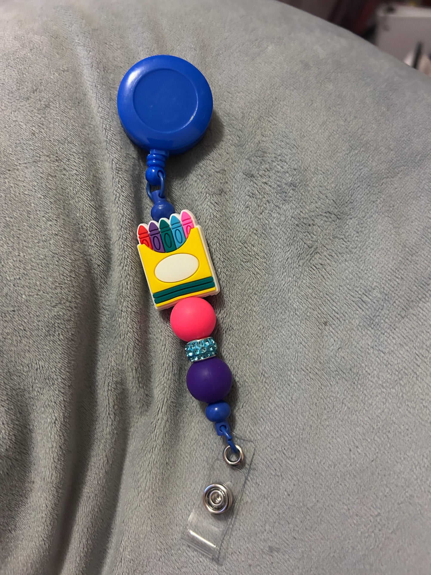 Crayon box - badge reel