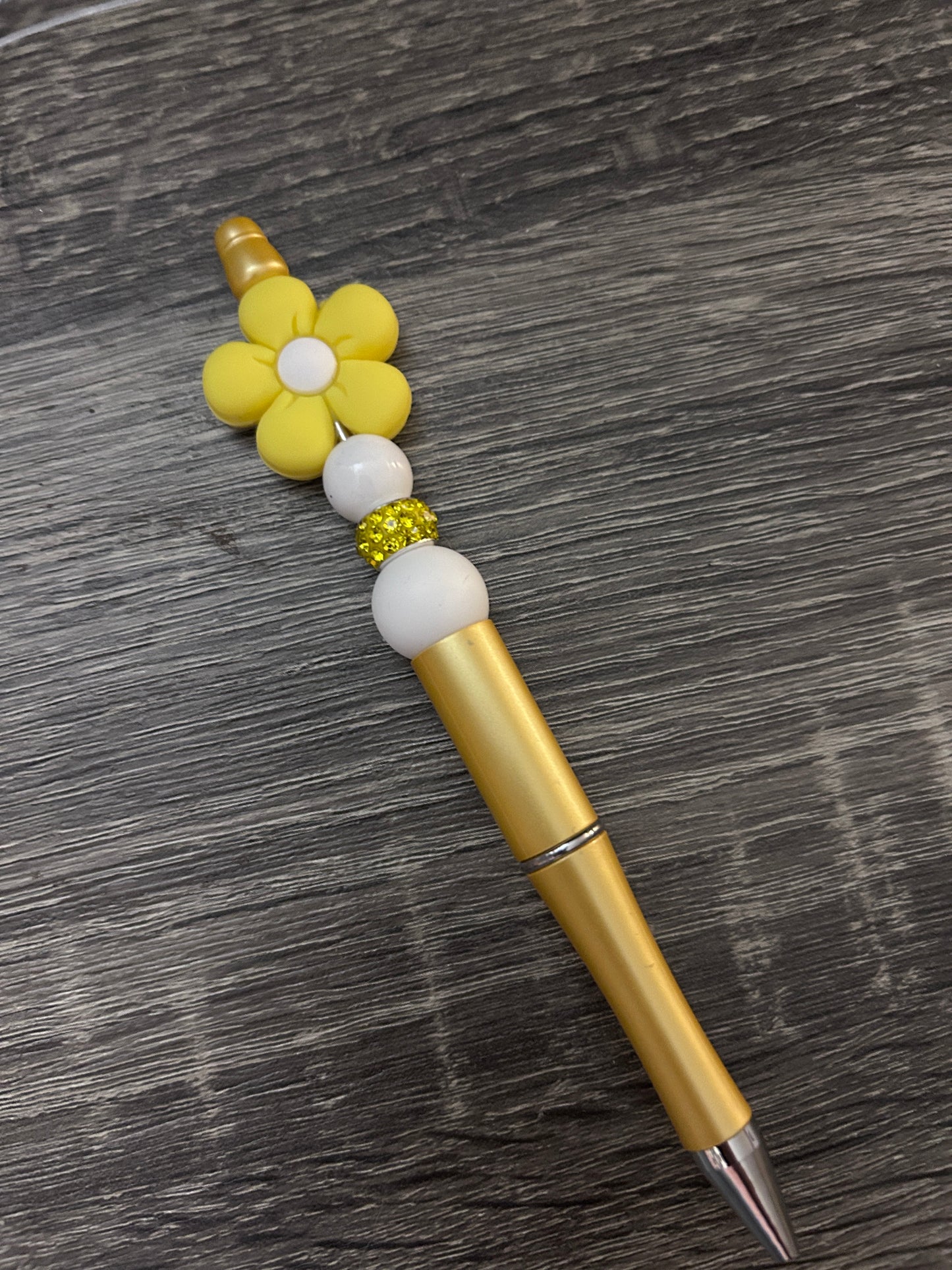 Yellow "flower power" pen with yellow barrel